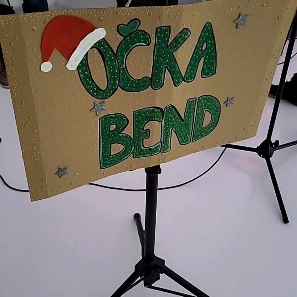 Prižig lučk z očka bendom
